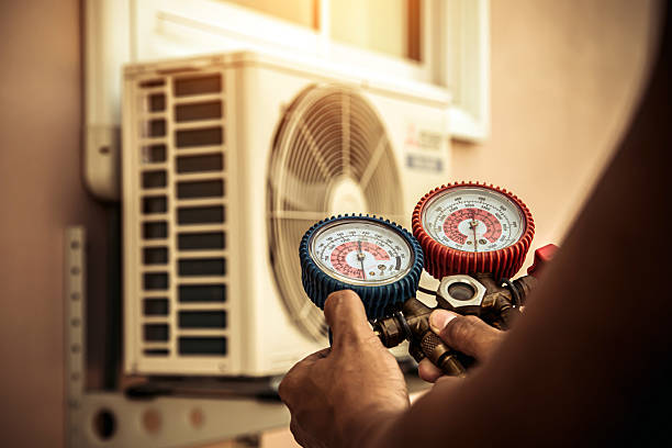 Professional Air Conditioning Service technician working in South Vienna, OH